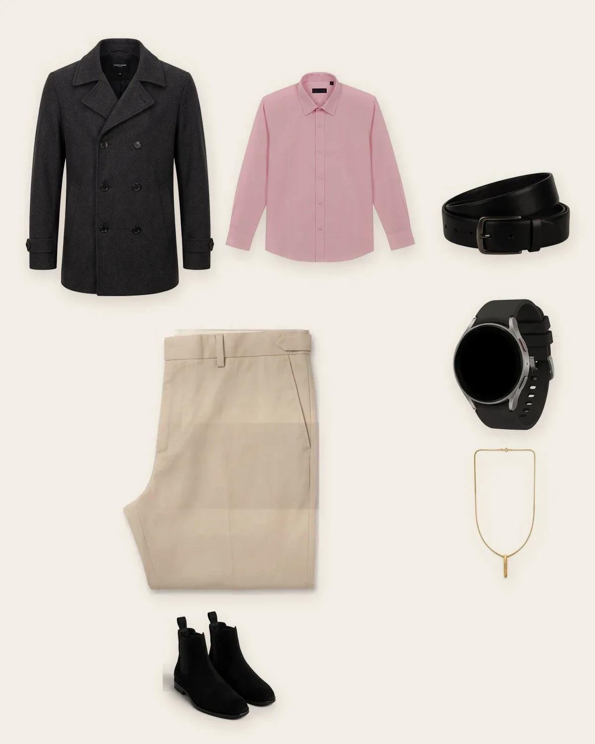 Charcoal peacoat over a blush shirt, beige trousers, black Chelsea boots, a belt and a watch